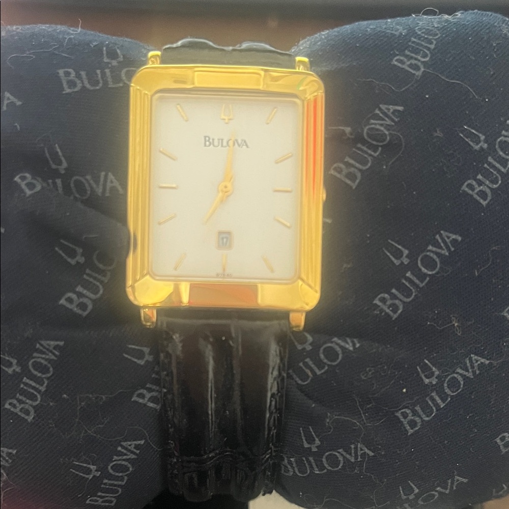Bulova Gold Case with Black Strap Watch